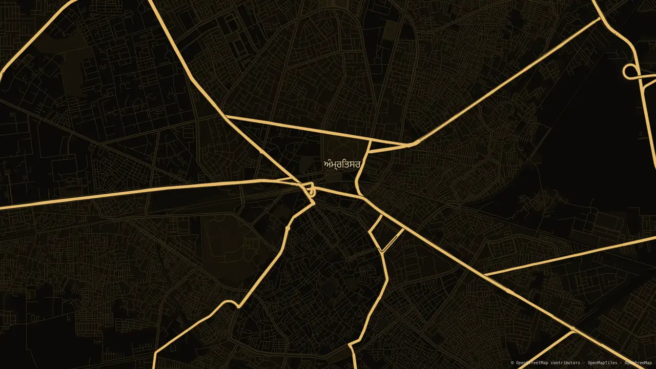 Amritsar as a Brasslight map wallpaper, 1920 × 1080: gold arteries radiating across a near-black city, labelled ਅੰਮ੍ਰਿਤਸਰ in Punjabi.