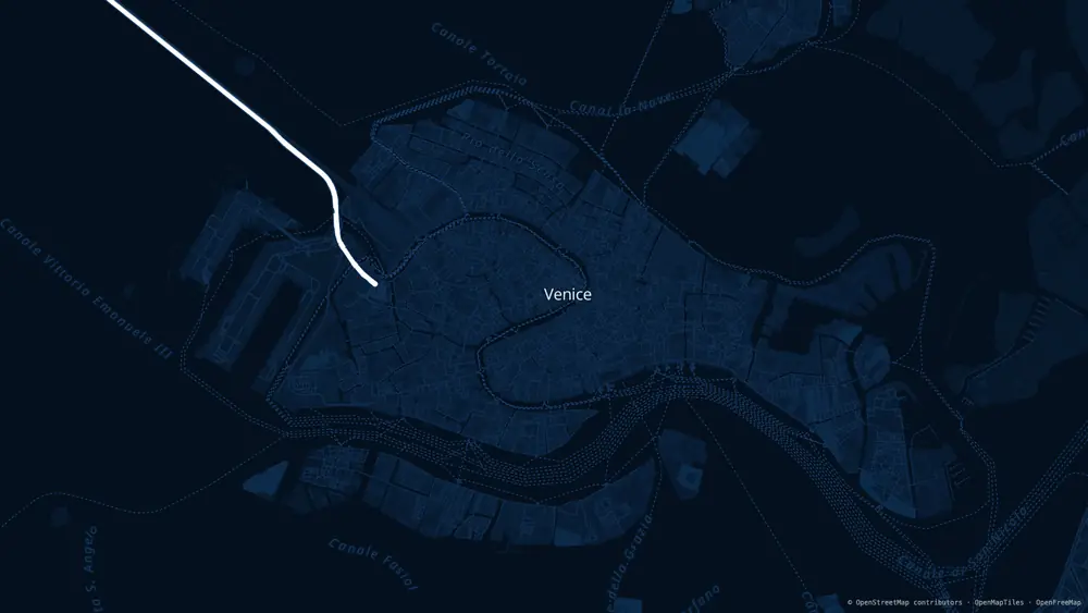 Venice as a Blueprint map wallpaper, 1920 × 1080: chalk-white streets and canal names on deep navy, the lagoon almost black.